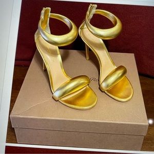 Gianvito Rossi’s Bijoux sandals are crafted of metallic leather and showcase.